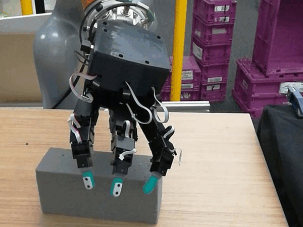 Dexterous robotic hand reaching to lift rectangular brick