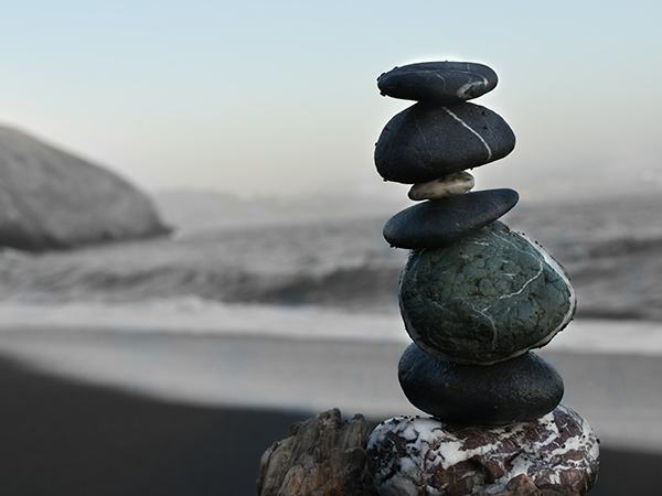 Stacked rocks in a beach scene