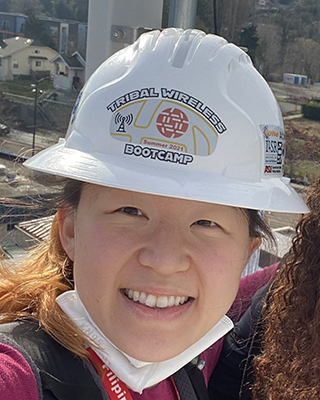 Portrait of Esther Jang in a hardhat