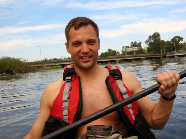 Photo of Kyril Faenov sitting in a kayak on the water