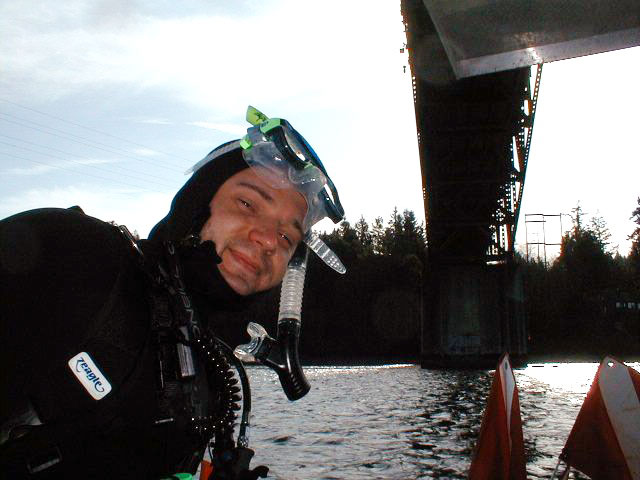 Photo of Kyril Faenov in the water wearing scuba diving equipment